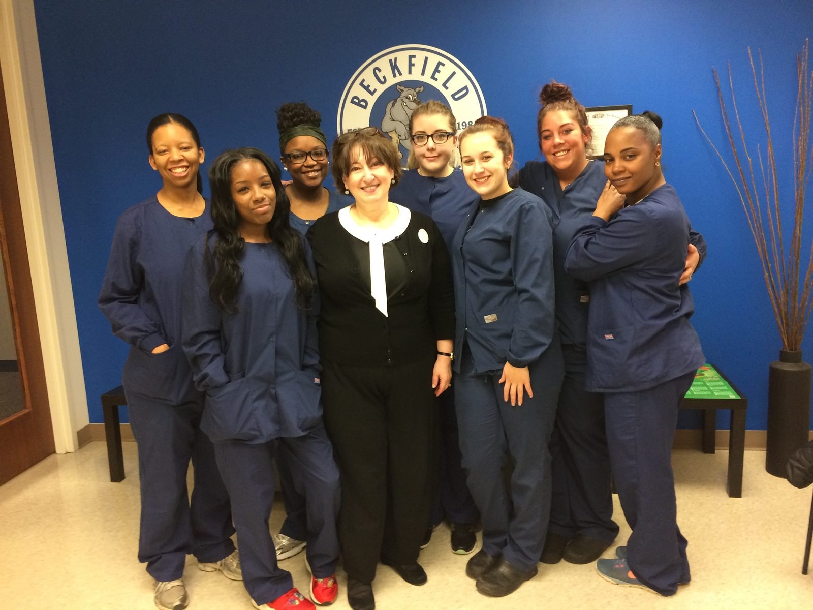 Marina Davar with faculty and students in the dental assisting program she built at Beckfield College